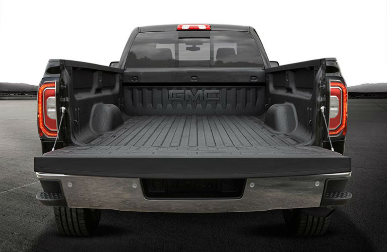 bed of the 2018 GMC Sierra showcasing the bed volume. 